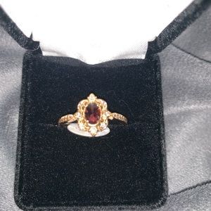 Burgundy stone ring from fragrant Jewels. Size 10